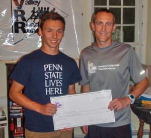Ryan Cerrone was presented with a check by Scholarship Committee member Chris Garges